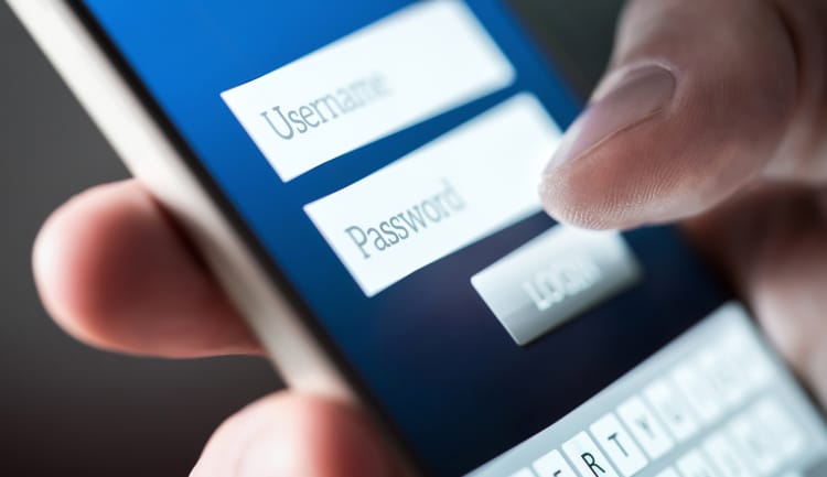 Login with smartphone to Username and password. Registration to website. Personal security. Online bank or personal information. Identity theft, scam or fraud. Macro close up of phone screen.